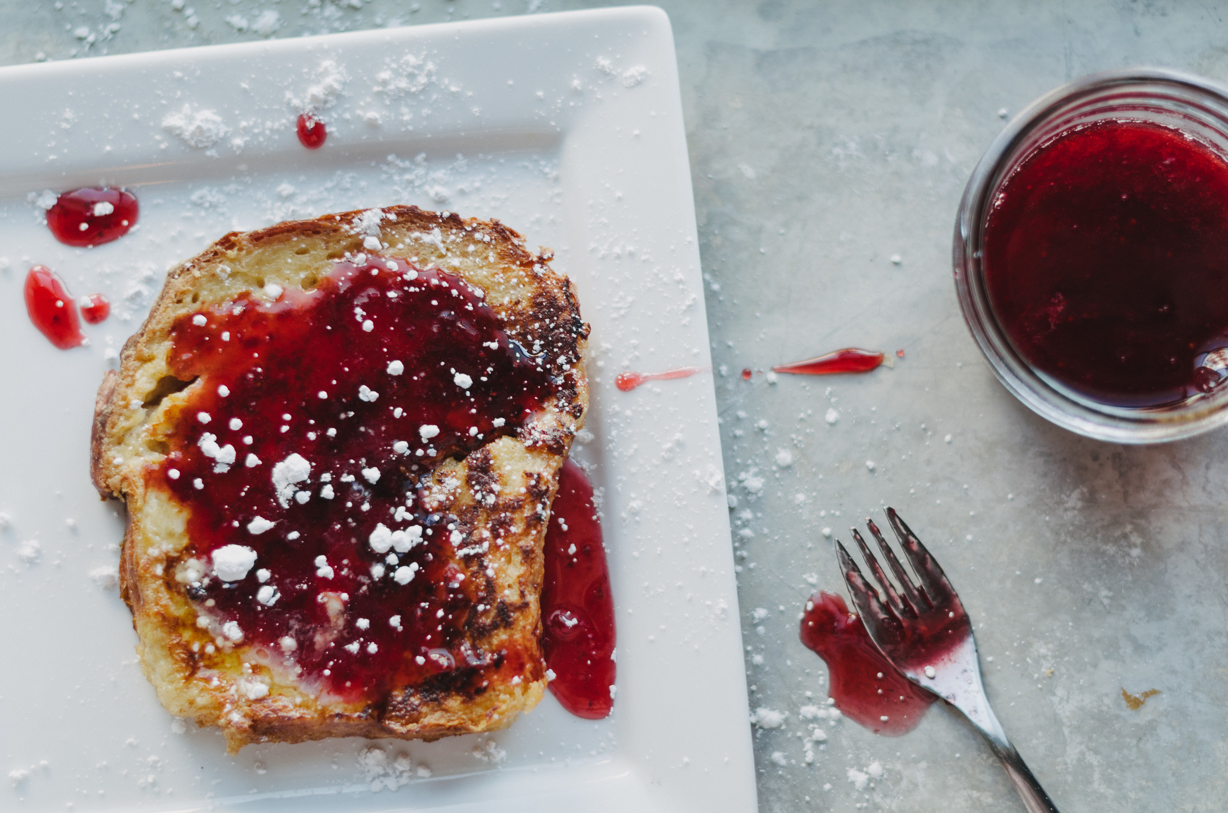 Bread Pudding French toast with Strawberry Syrup. 1 loaf of brioche cut into 1 inch slices (about 10 slices)1 cube soft butter4 eggs3 cups milk1 tbsp. cinnamon1 tsp. vanilla½ cup packed brown sugar½ tsp. salt¾ cup powdered sugar (for dusting) Strawb…