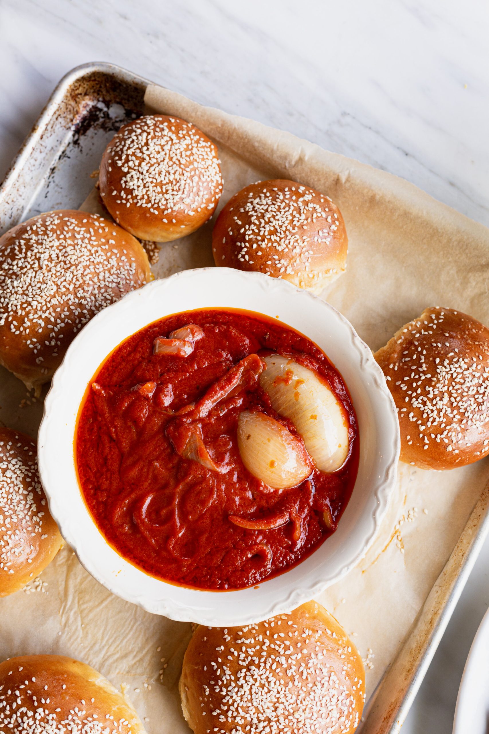 Marinara for the Crispy Chicken Parm Sandwich on a table.