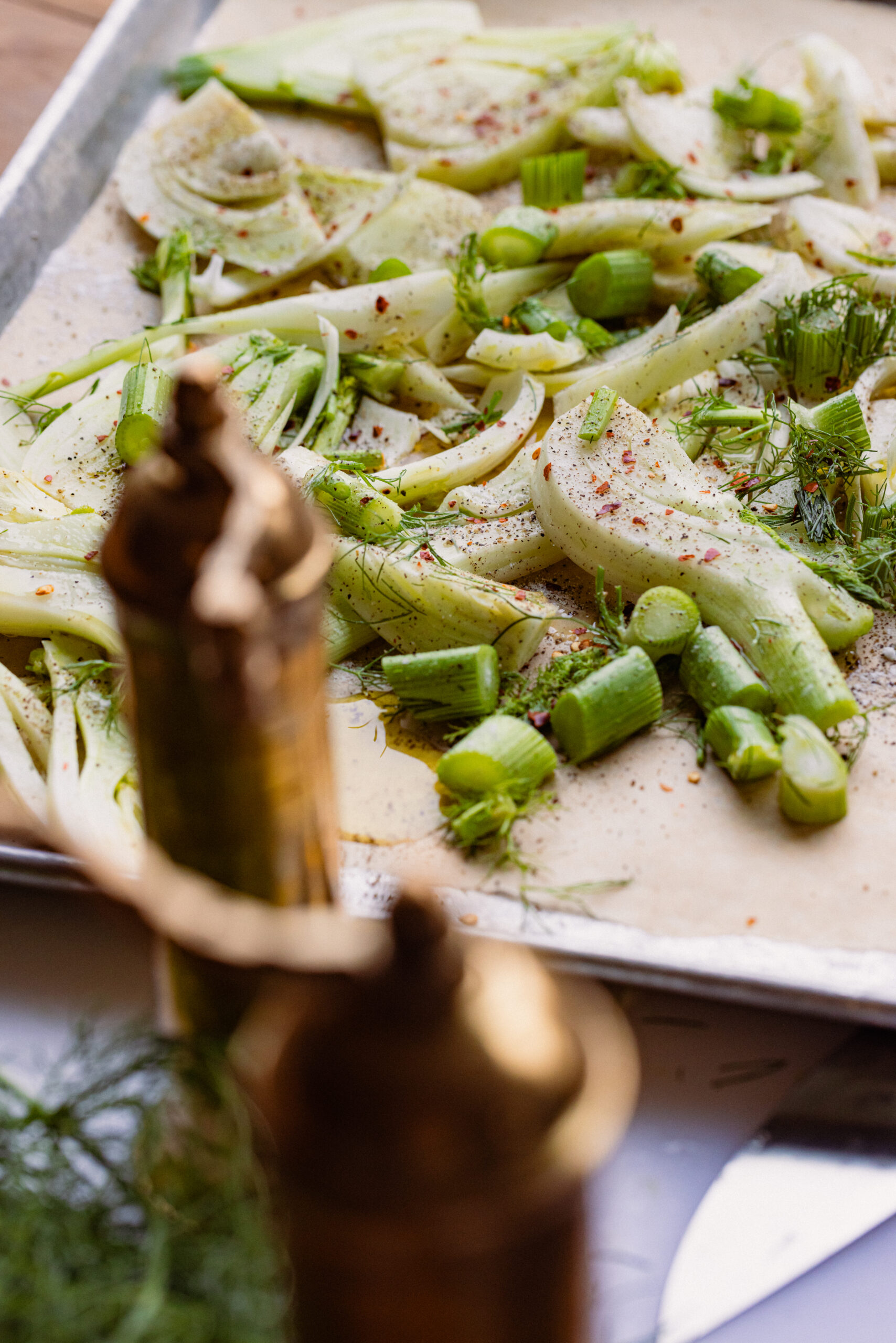 Diced fennel on a baking sheet.