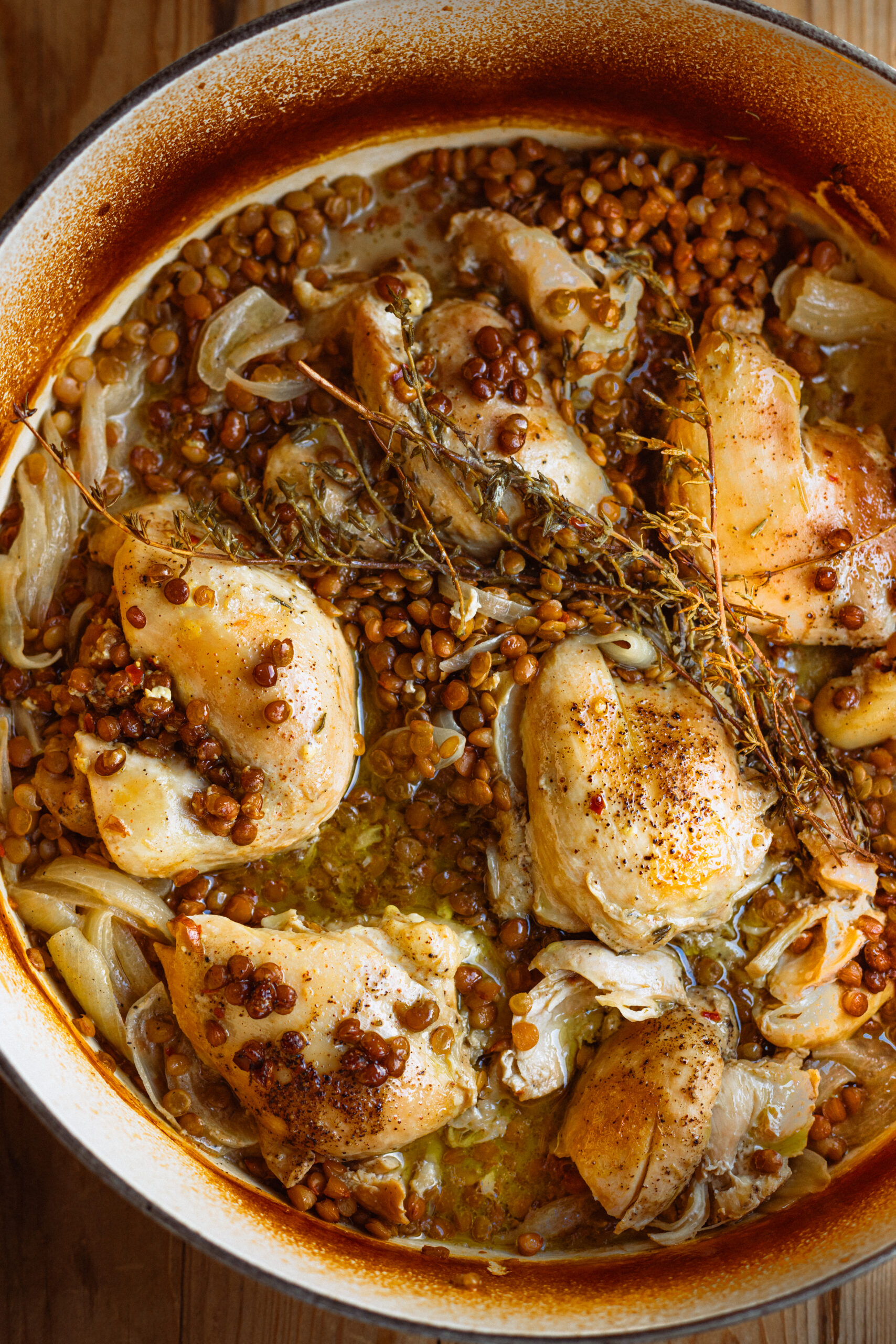 Overhead photo of French Style Mustard Braised Chicken & Lentils in a pot.